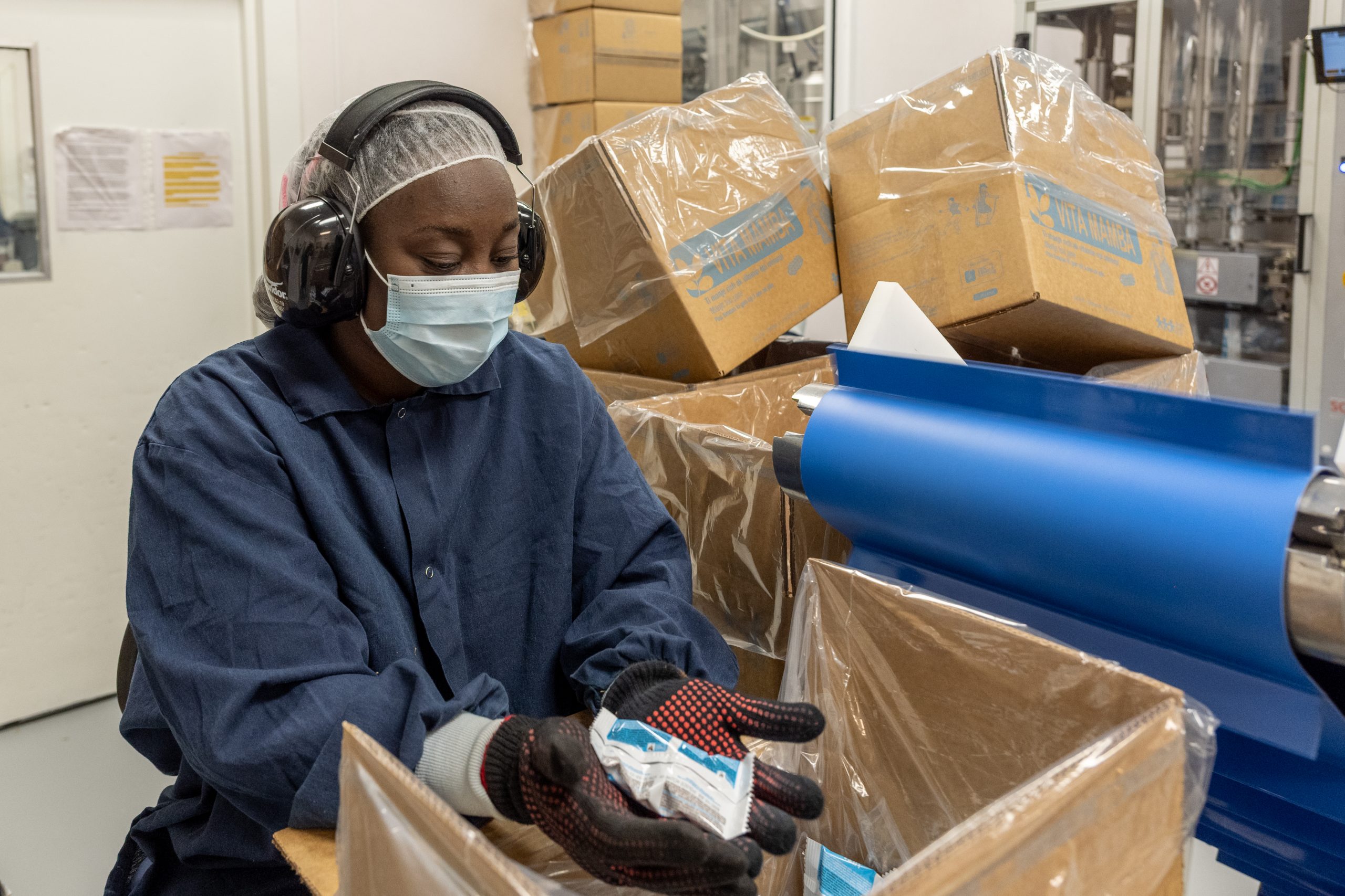 Haitian woman in RUTF factory